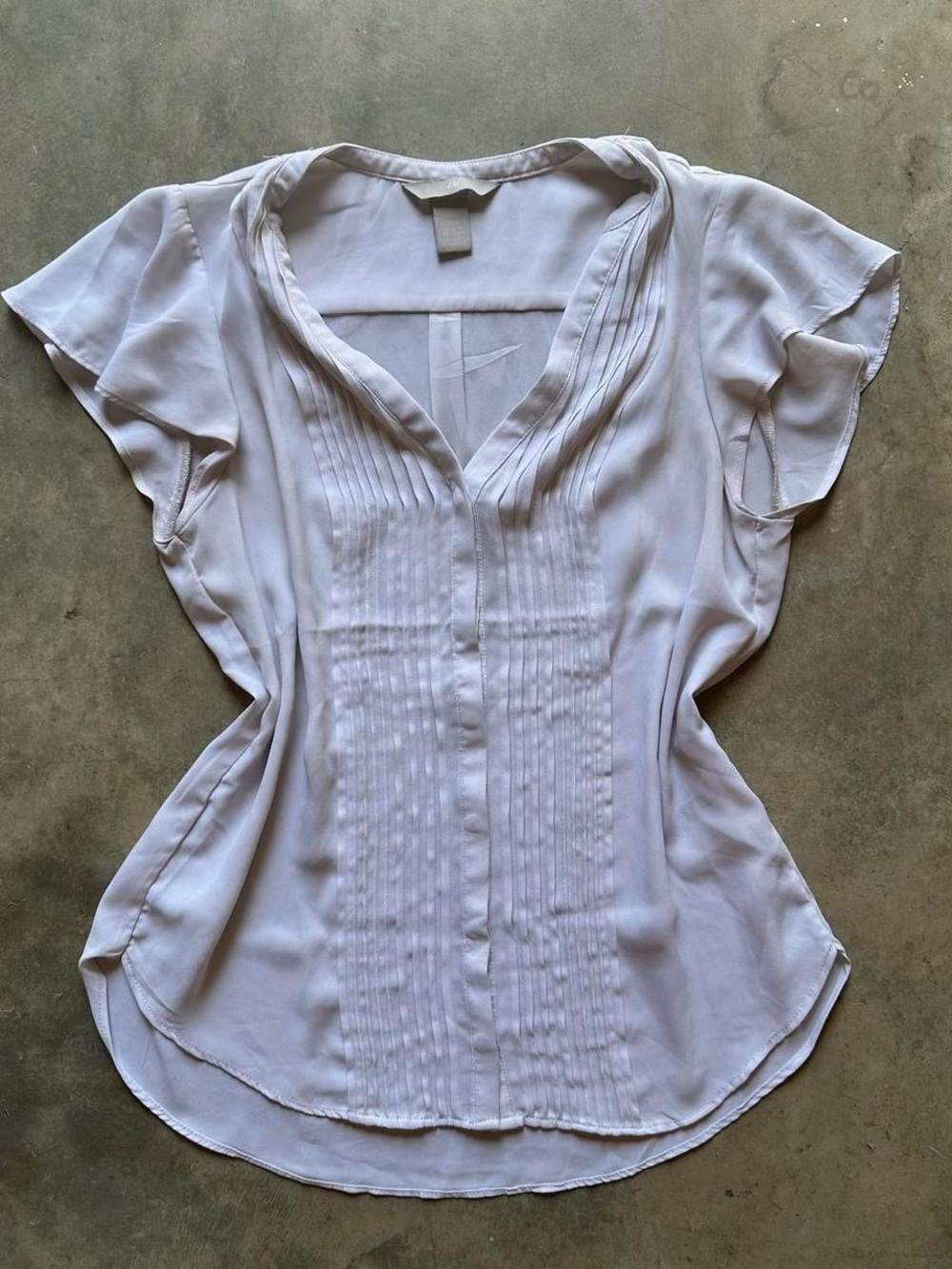 H&M Cream blouse with ruffled sleeves